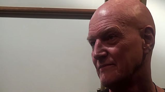 CHRIS SLADE CONFIRMS RETURN TO AC/DC