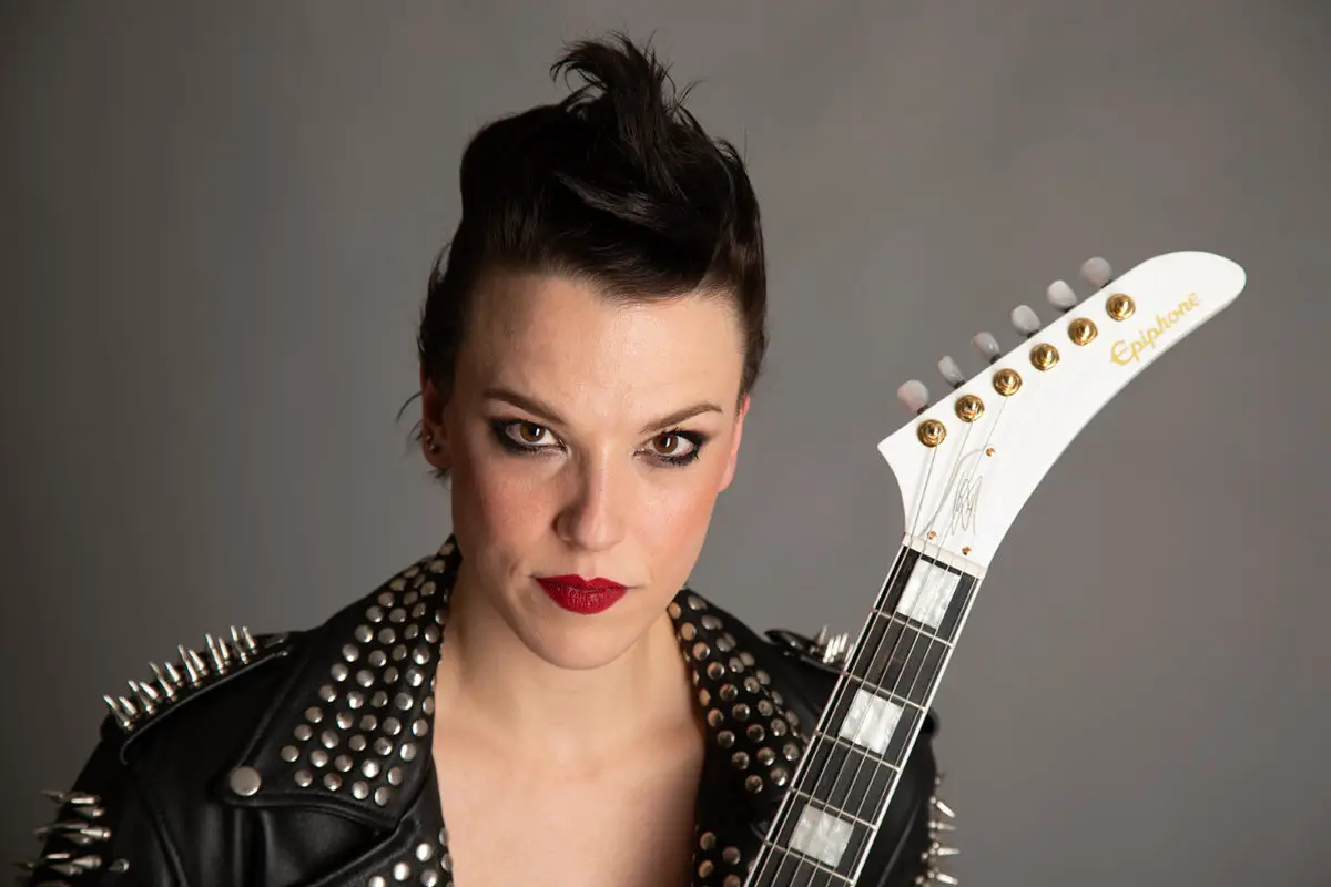 HALESTORM's LZZY HALE Says Getting COVID-19 Vaccine Means You Are Bein...