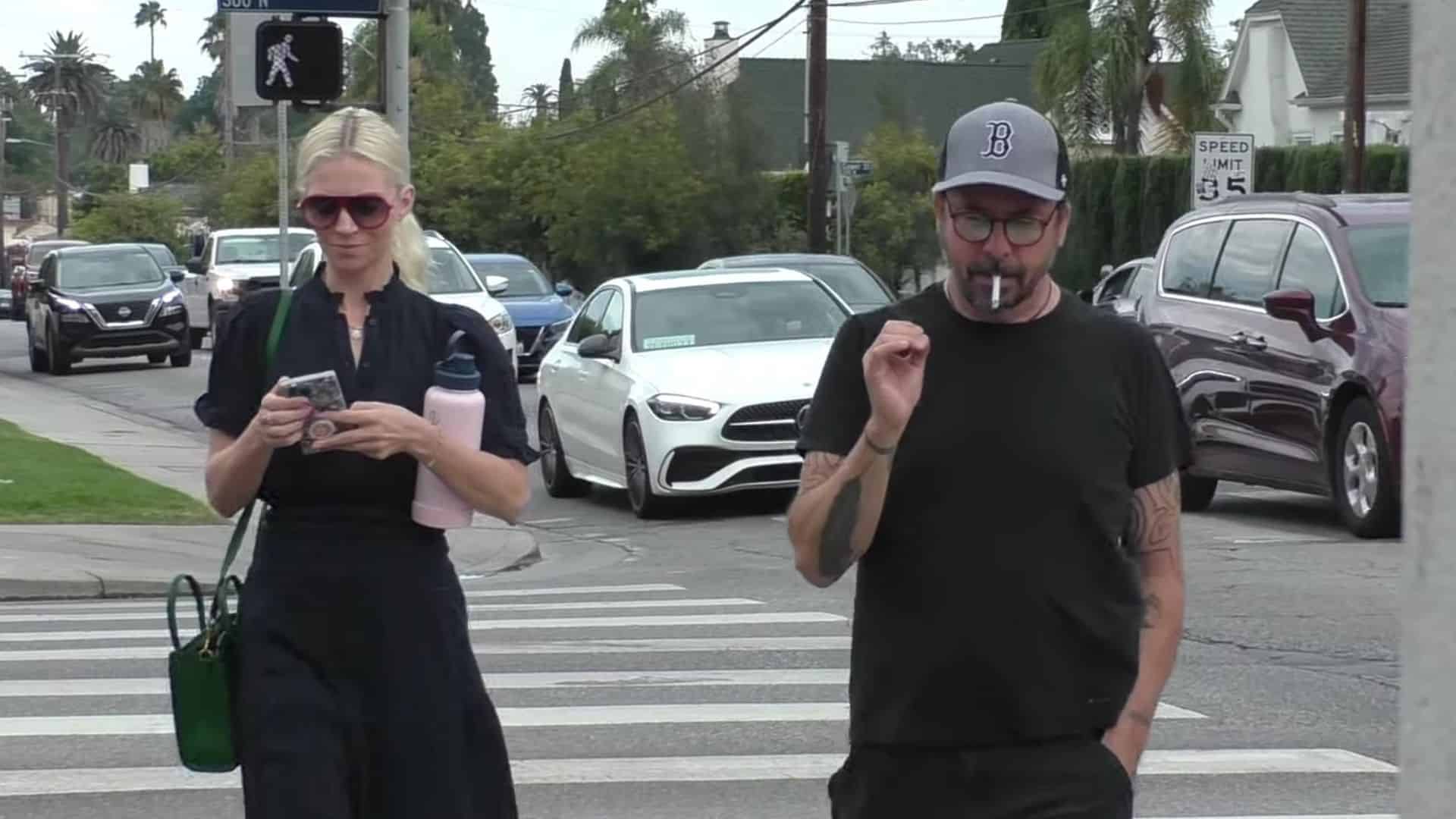 Dave Grohl walking with his wife Jordyn Blum